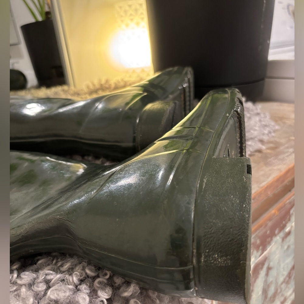 Hunter rain boots with socks.